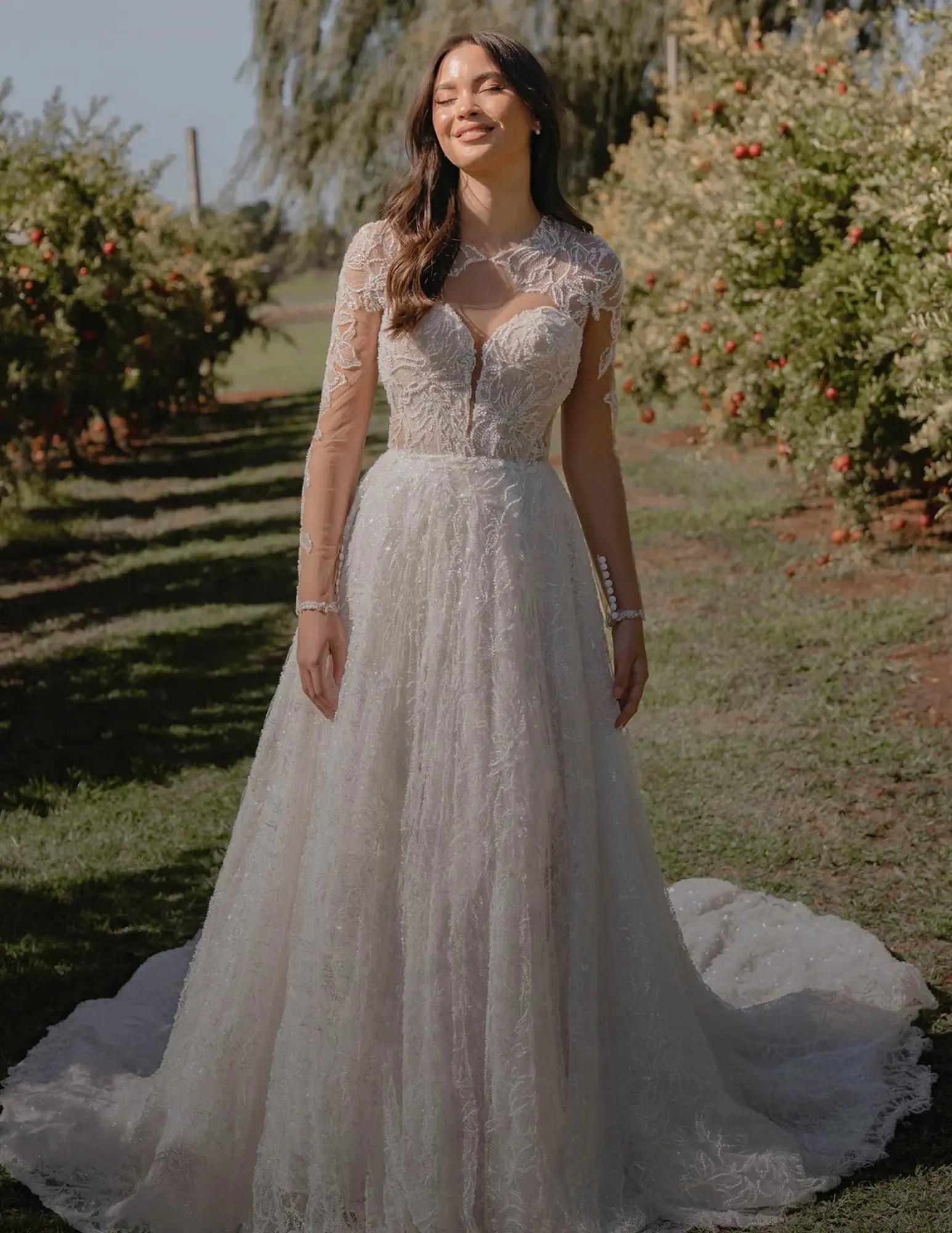 Bride in Madi Lane Gown/