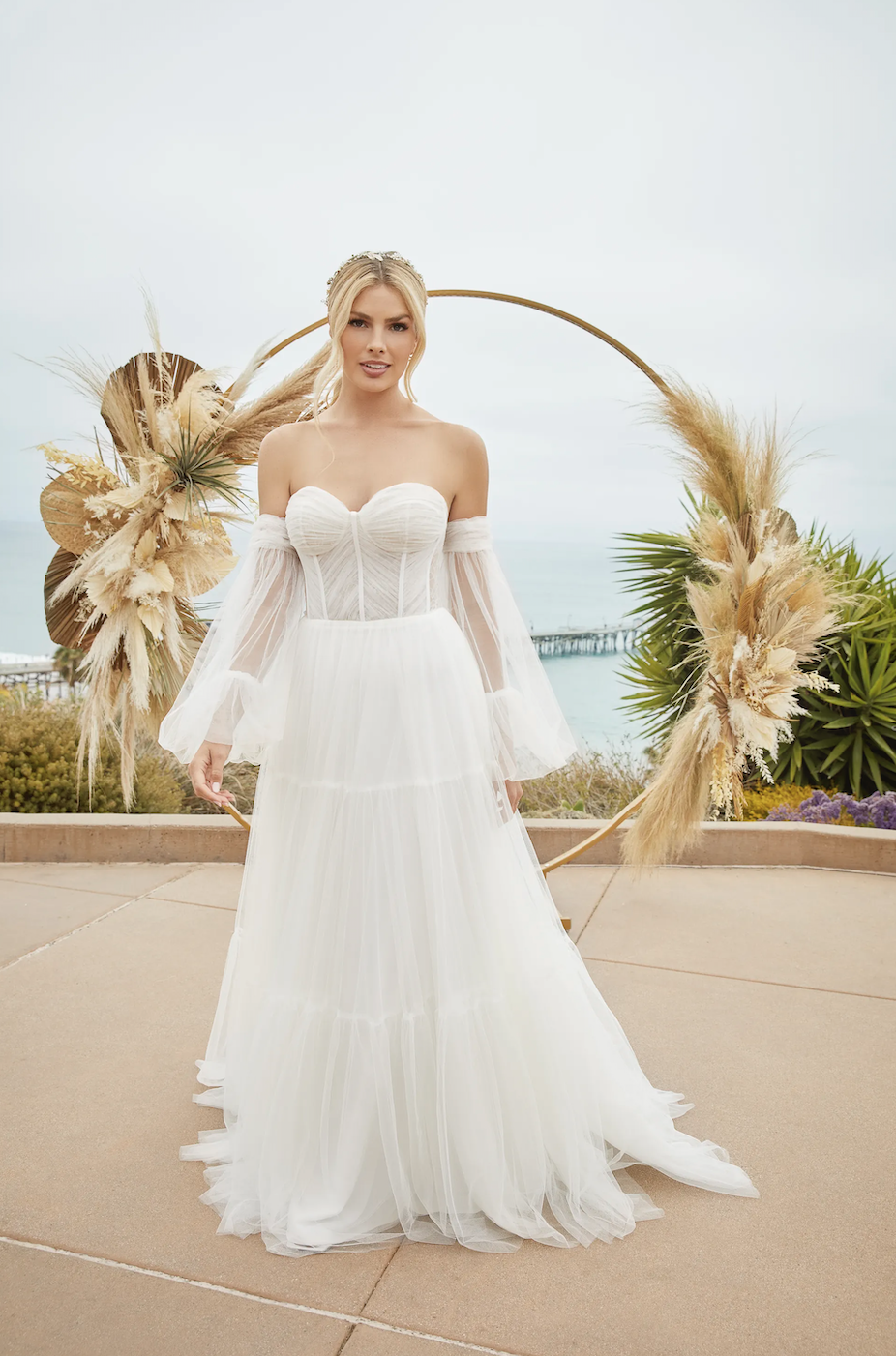 Model wearing Carson wedding dress by Beloved by Casablanca