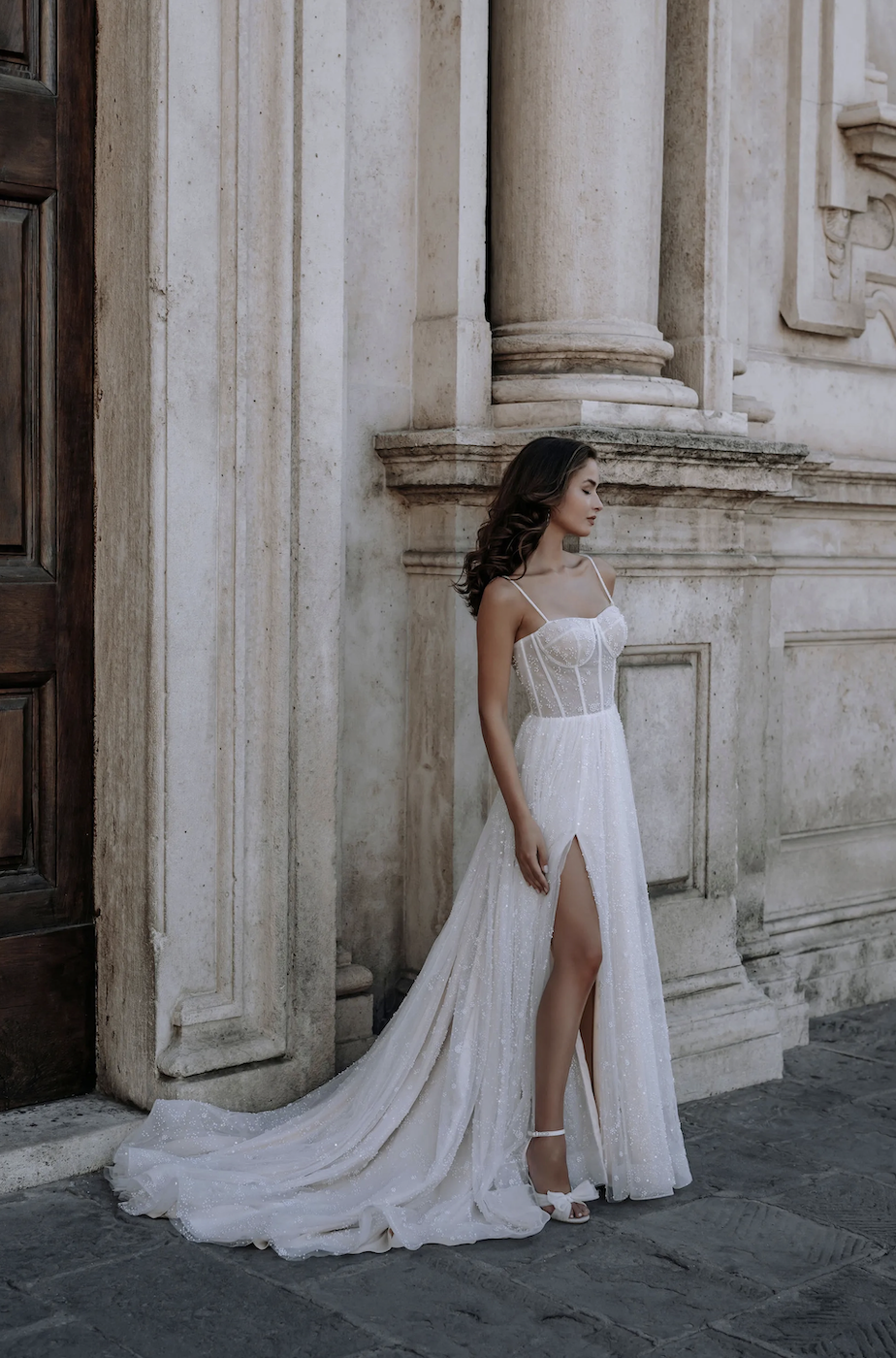 Model wearing Zuma wedding dress by Abella