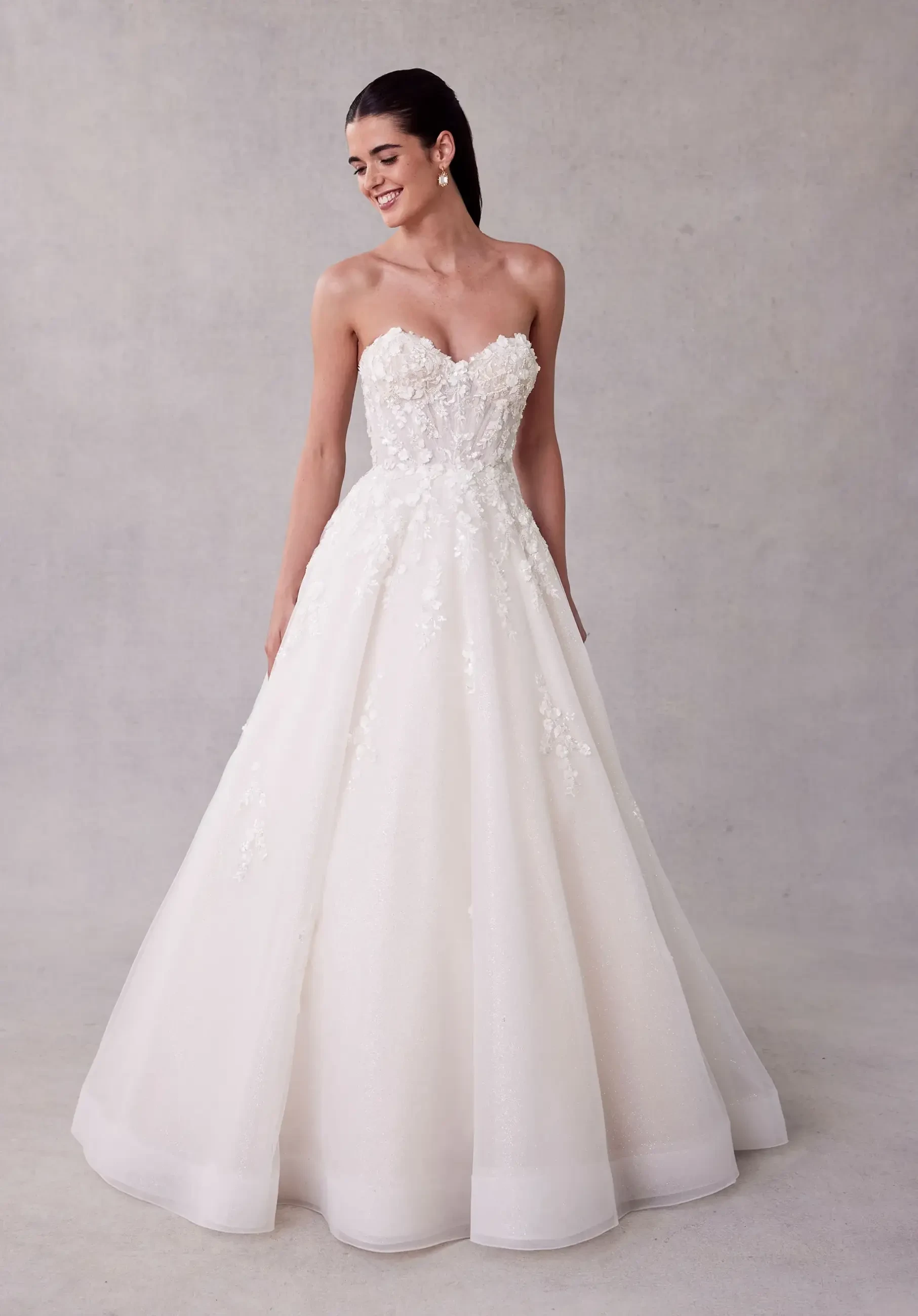 Model wearing Morilee wedding dress
