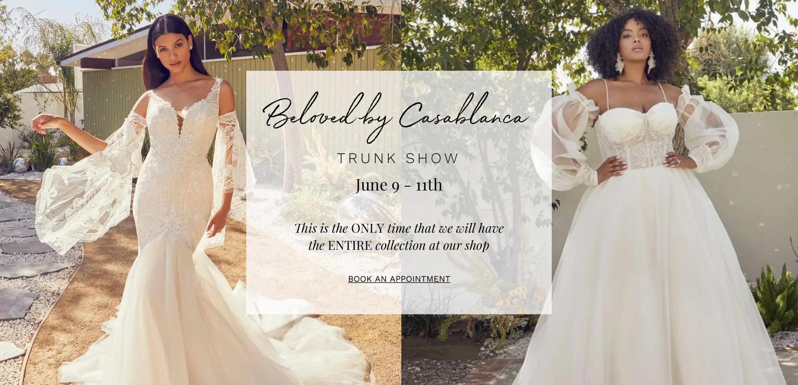 Beloved by Casablanca Trunk Show at Dublin Bridal. Two models wearing Beloved by Casablanca wedding dresses.