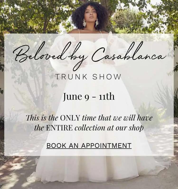 Beloved by Casablanca Trunk Show at Dublin Bridal. Two models wearing Beloved by Casablanca wedding dresses.
